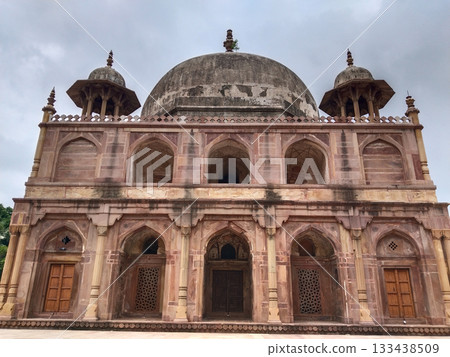 Historical Mughal-era tomb of Khusrau Mirza in Khusro Bagh, Prayagraj, India, showcasing intricate sandstone architecture and Indo-Islamic design elements. 133438509