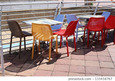 Chair and table in a city cafe on the seafront in Tel Aviv. 133438767