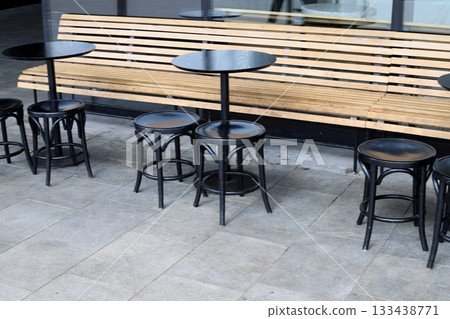 Chair and table in a city cafe on the seafront in Tel Aviv. 133438771