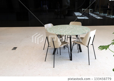 Chair and table in a city cafe on the seafront in Tel Aviv. 133438779