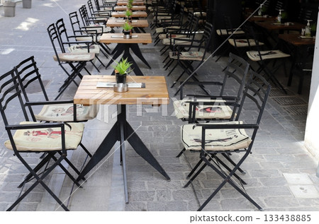 Chair and table in a city cafe on the seafront in Tel Aviv. Chair and table in a city cafe on the seafront in Tel Aviv. 133438885