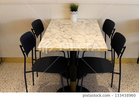 Chair and table in a city cafe on the seafront in Tel Aviv. 133438960