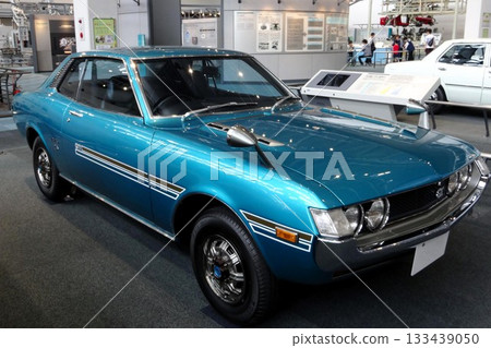 A blue sports car (Toyota Celica (first generation) Coupe 1600GT) on display at the museum 133439050
