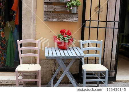 Chair and table in a city cafe on the seafront in Tel Aviv. 133439145