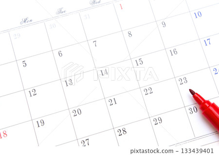 Calendar and red permanent marker 133439401