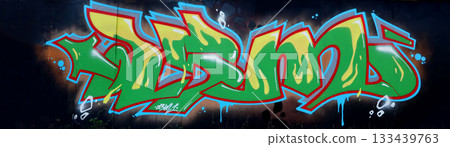 The old wall decorated with paint stains in the style of street art culture. Colorful background of full graffiti painting artwork with bright aerosol outlines on wall. Colored background texture The old wall decorated with paint stains in the style of street art culture. Colorful background of full graffiti painting artwork with bright aerosol outlines on wall. Colored background texture 133439763