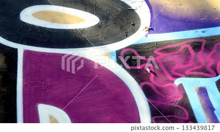 Colorful background of graffiti painting artwork with bright aerosol outlines on wall. Old school street art piece made with aerosol spray paint cans. Contemporary youth culture backdrop Colorful background of graffiti painting artwork with bright aerosol outlines on wall. Old school street art piece made with aerosol spray paint cans. Contemporary youth culture backdrop 133439817