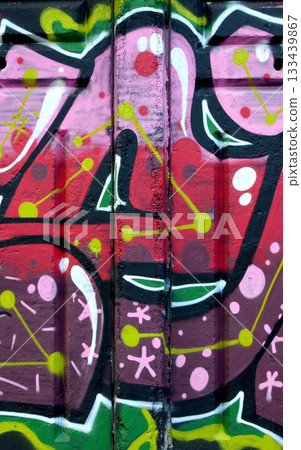 Colorful background of graffiti painting artwork with bright aerosol outlines on wall. Old school street art piece made with aerosol spray paint cans. Contemporary youth culture backdrop Colorful background of graffiti painting artwork with bright aerosol outlines on wall. Old school street art piece made with aerosol spray paint cans. Contemporary youth culture backdrop 133439867