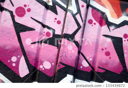 Colorful background of graffiti painting artwork with bright aerosol outlines on wall. Old school street art piece made with aerosol spray paint cans. Contemporary youth culture backdrop Colorful background of graffiti painting artwork with bright aerosol outlines on wall. Old school street art piece made with aerosol spray paint cans. Contemporary youth culture backdrop 133439872