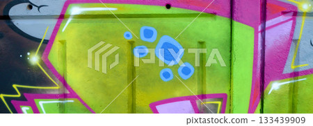Colorful background of graffiti painting artwork with bright aerosol outlines on wall. Old school street art piece made with aerosol spray paint cans. Contemporary youth culture backdrop Colorful background of graffiti painting artwork with bright aerosol outlines on wall. Old school street art piece made with aerosol spray paint cans. Contemporary youth culture backdrop 133439909