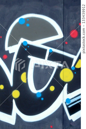 Colorful background of graffiti painting artwork with bright aerosol outlines on wall. Old school street art piece made with aerosol spray paint cans. Contemporary youth culture backdrop Colorful background of graffiti painting artwork with bright aerosol outlines on wall. Old school street art piece made with aerosol spray paint cans. Contemporary youth culture backdrop 133439912
