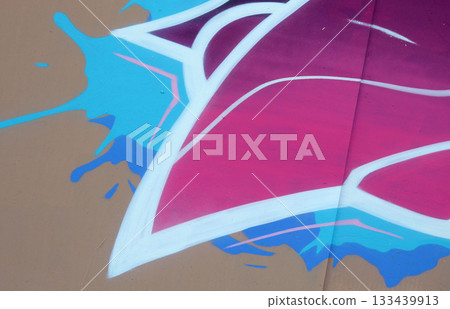 Colorful background of graffiti painting artwork with bright aerosol outlines on wall. Old school street art piece made with aerosol spray paint cans. Contemporary youth culture backdrop Colorful background of graffiti painting artwork with bright aerosol outlines on wall. Old school street art piece made with aerosol spray paint cans. Contemporary youth culture backdrop 133439913