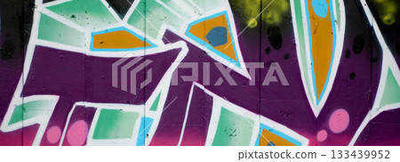 Colorful background of graffiti painting artwork with bright aerosol outlines on wall. Old school street art piece made with aerosol spray paint cans. Contemporary youth culture backdrop Colorful background of graffiti painting artwork with bright aerosol outlines on wall. Old school street art piece made with aerosol spray paint cans. Contemporary youth culture backdrop 133439952