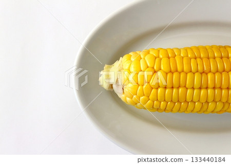 Corn on a white background viewed from directly above Corn on a white background viewed from directly above 133440184