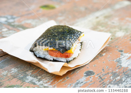 Pork and egg eaten outdoors 133440288