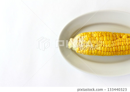 Wrinkled corn on a white background viewed from directly above Wrinkled corn on a white background viewed from directly above 133440323