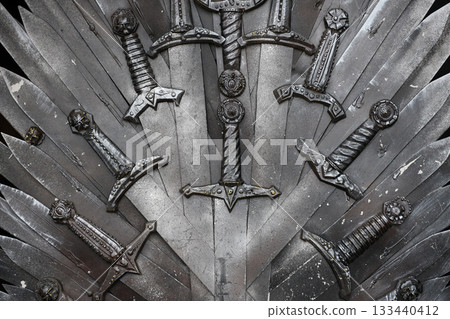Metal knight swords background close up. The concept Knights 133440412