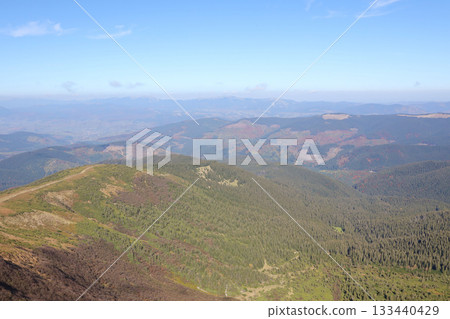 Landscape with Mount Hoverla hanging peak of the Ukrainian Carpathians against the background of the sky and clouds Landscape with Mount Hoverla hanging peak of the Ukrainian Carpathians against the background of the sky and clouds 133440429