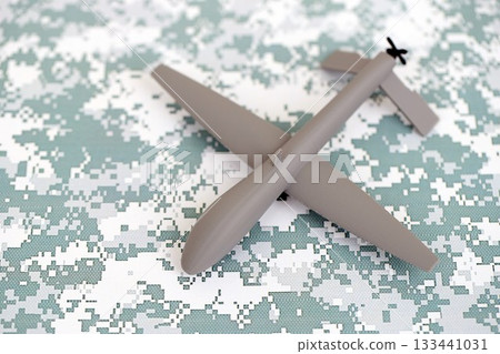 Drone unmanned autonomous technology of espionage and strikes on the enemy. Toy uav drone close up 133441031