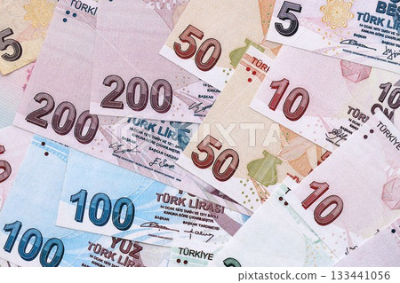 Turkish Liras currency money bills. TRY currency banknotes in pile with different denomination close up 133441056