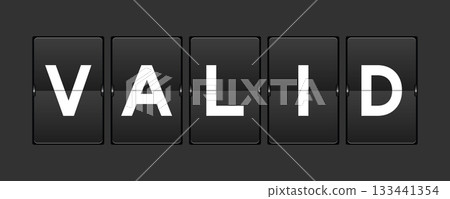 Black color analog flip board with word valid on gray background Black color analog flip board with word valid on gray background 133441354