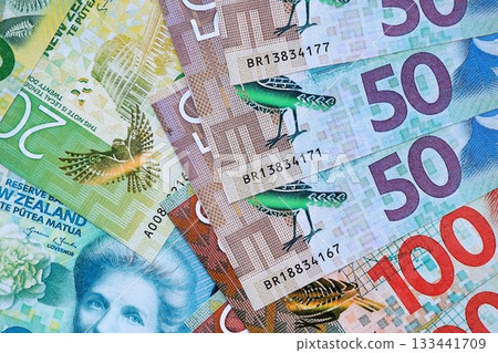 New Zealand dollar money bills in big amount on table close up. Rich life concept in New Zealand. Business and economy 133441709