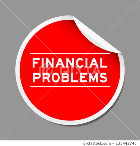 Red color peel sticker label with word financial problems on gray background Red color peel sticker label with word financial problems on gray background 133442743