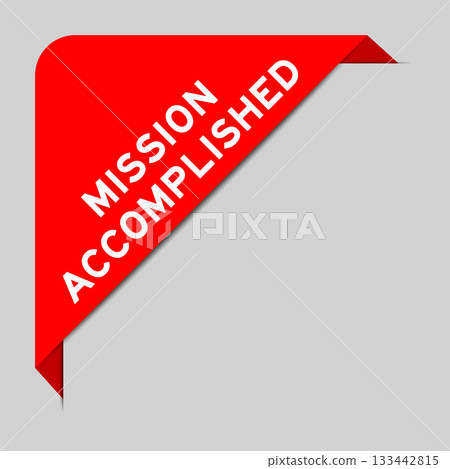 Red color of corner label banner with word mission accomplished on gray background 133442815