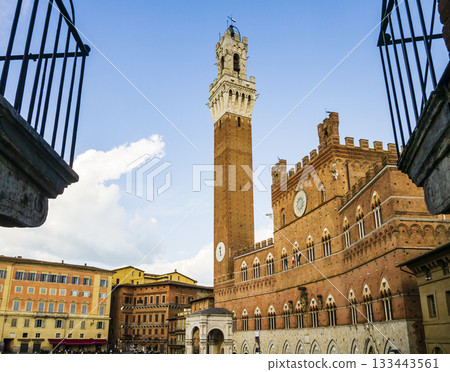 Siena main square, Piazza del Campo, and its most famous monuments in a sunny day, Tuscany, Italy Siena main square, Piazza del Campo, and its most famous monuments in a sunny day, Tuscany, Italy 133443561