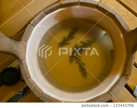 Sauna Bucket with Oak Leaves for Traditional Steam Ritual Sauna Bucket with Oak Leaves for Traditional Steam Ritual 133443706