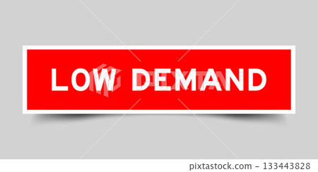 Red color square shape sticker label with word low demand on gray background 133443828