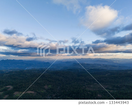 Panoramic view on green hill valley 133443943