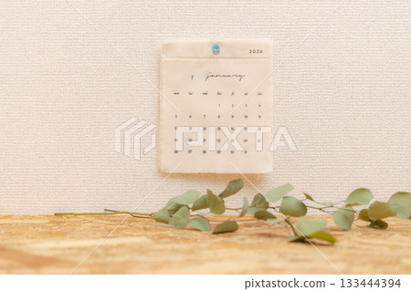 January 2026 fabric calendar and houseplant stock photo January 2026 fabric calendar and houseplant stock photo 133444394