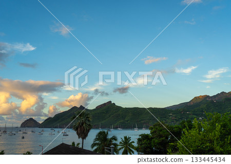 Taiohae Bay at sunset with sailboats in Nuku Hiva, Marquesas Islands, French Polynesia 133445434