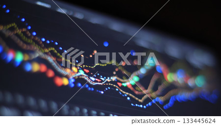 Defocused colorful data visualization, line graph and analytics on computer screen, abstract financial chart, technology and business analysis concept, blurred digital display 133445624