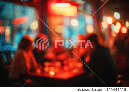 Defocused group of people sitting around table in bar with neon lights, warm atmosphere, socializing, blurred background, evening, urban nightlife, relaxed mood Defocused group of people sitting around table in bar with neon lights, warm atmosphere, socializing, blurred background, evening, urban nightlife, relaxed mood 133445626