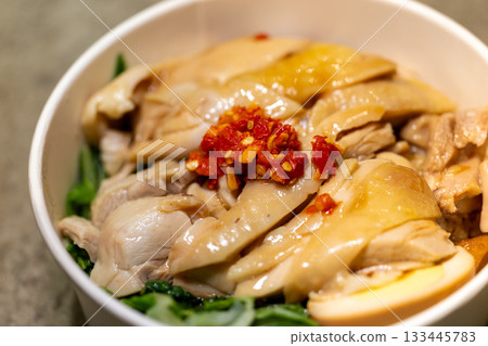 Taiwanese traditional dish: tender chicken rice served with braised sauce and chili. Taiwanese traditional dish: tender chicken rice served with braised sauce and chili. 133445783