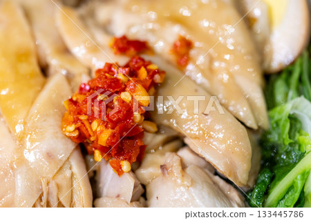 Taiwanese traditional dish: tender chicken rice served with braised sauce and chili. 133445786