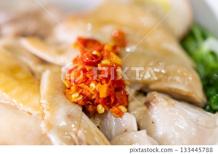 Taiwanese traditional dish: tender chicken rice served with braised sauce and chili. 133445788