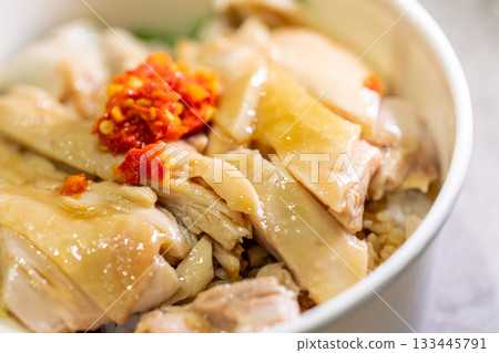 Taiwanese traditional dish: tender chicken rice served with braised sauce and chili. Taiwanese traditional dish: tender chicken rice served with braised sauce and chili. 133445791