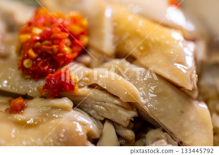 Taiwanese traditional dish: tender chicken rice served with braised sauce and chili. 133445792