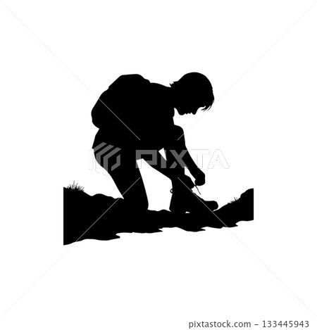 man tightening shoe 133445943