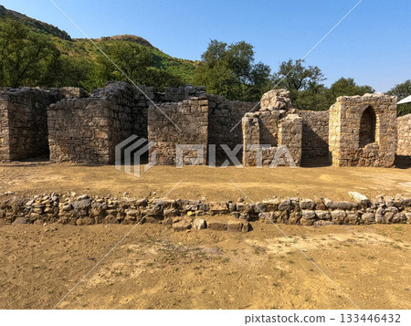 Heritage Buddhist residential rooms with stone walls and doorways Mohra Muradu Taxila ruins 133446432