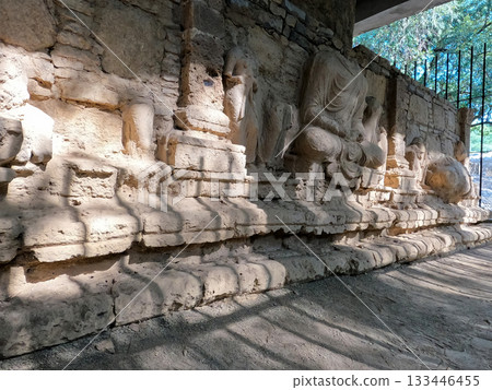 Heritage Gandhara stupa wall with bas-relief devotional figures Mohra Muradu Buddhist ruins Taxila Pakistan 133446455