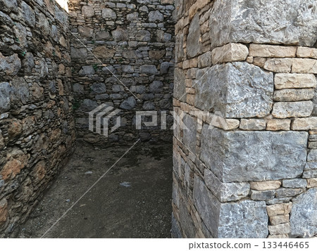 Heritage narrow stone passage showing monastic layout in Gandhara ruins Mohra Muradu Taxila 133446465