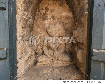 Heritage seated Buddha with surrounding attendant figures in Gandhara monastery Mohra Muradu Taxila Pakistan Heritage seated Buddha with surrounding attendant figures in Gandhara monastery Mohra Muradu Taxila Pakistan 133446469