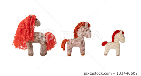 Set of crocheted toy fiery red horse isolated on a white background. The symbol of the year 2026. Chinese New Year greeting card 133446602