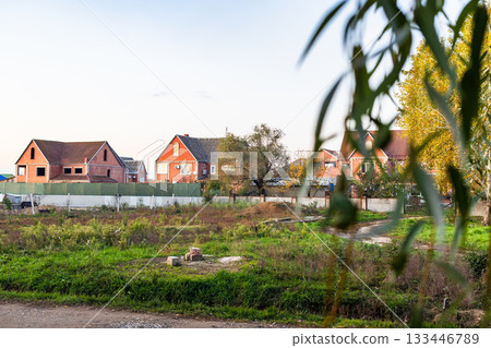 view of cottages under construction on vacant lot view of cottages under construction on vacant lot 133446789
