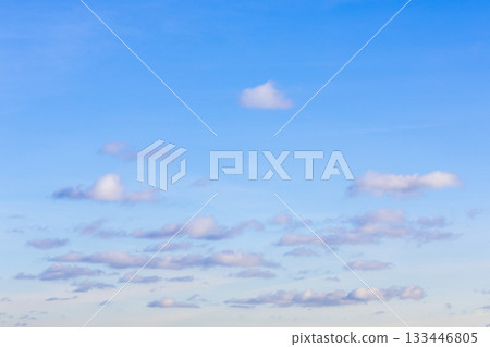 many cumuli clouds in light blue sky on autumn day many cumuli clouds in light blue sky on autumn day 133446805
