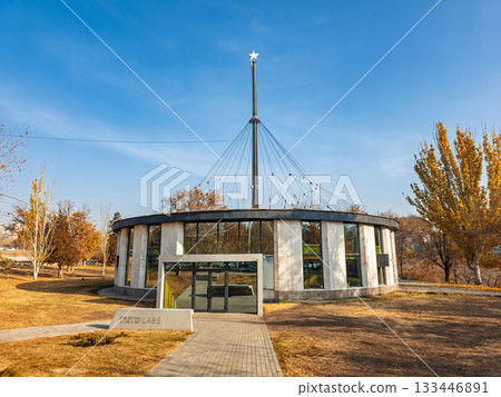 A large building with a dome on top and a star on top of it 133446891